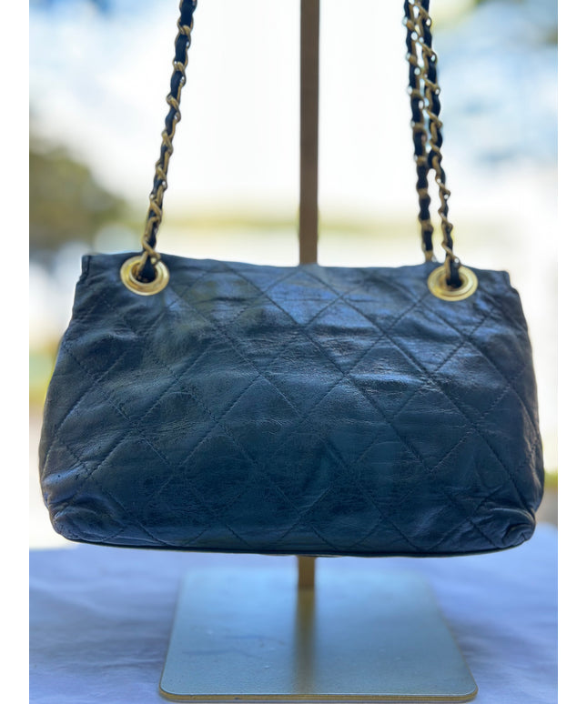 Chanel black leather flap chain bag