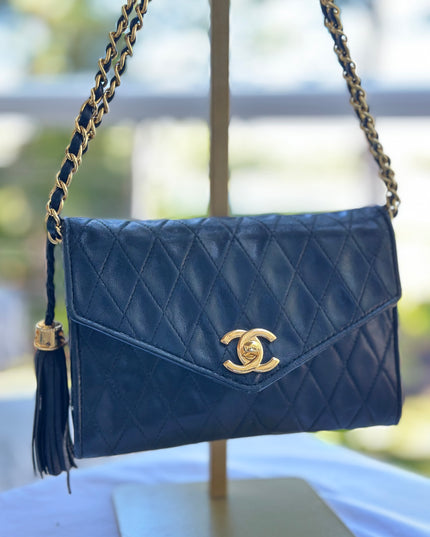 Sold!! Chanel black leather flap turn lock bag
