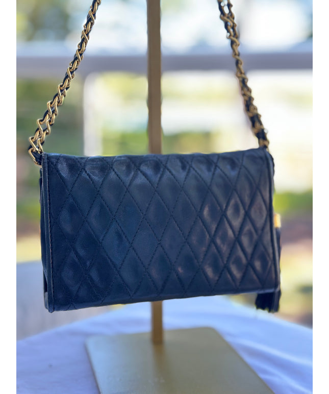 Sold!! Chanel black leather flap turn lock bag