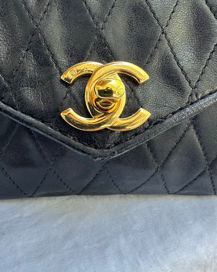 Sold!! Chanel black leather flap turn lock bag