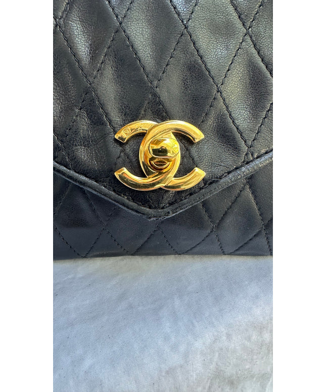 Sold!! Chanel black leather flap turn lock bag