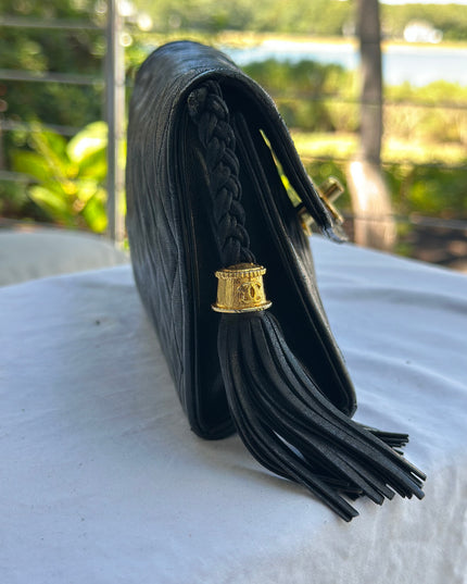 Sold!! Chanel black leather flap turn lock bag