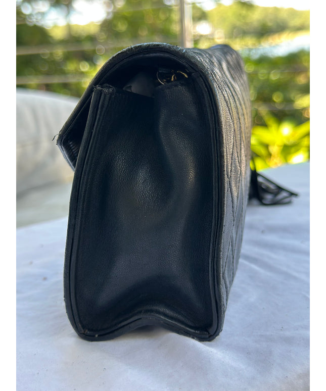 Sold!! Chanel black leather flap turn lock bag