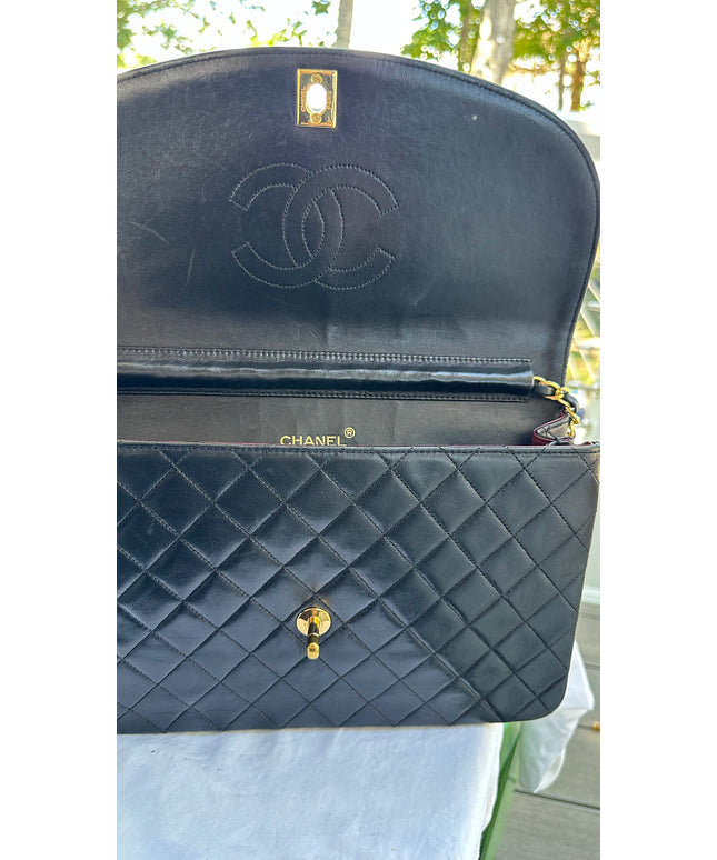 Chanel black leather flap turnlock bag