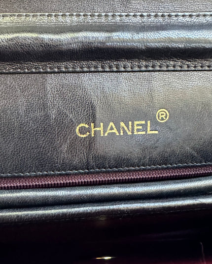 Chanel black leather flap turnlock bag