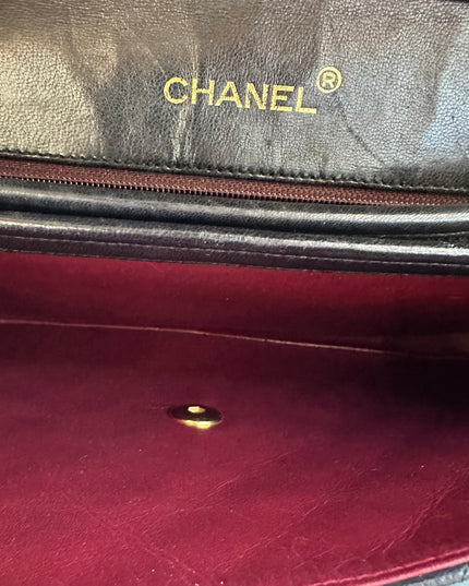 Chanel black leather flap turnlock bag
