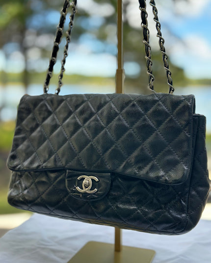 Sold! Chanel black caviar flap bag