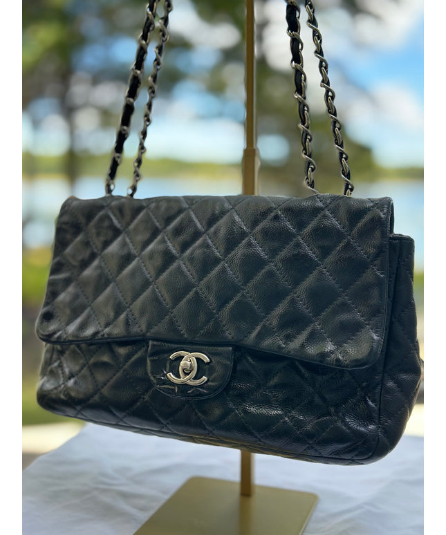 Sold! Chanel black caviar flap bag