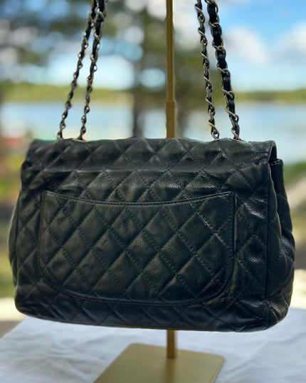 Sold! Chanel black caviar flap bag