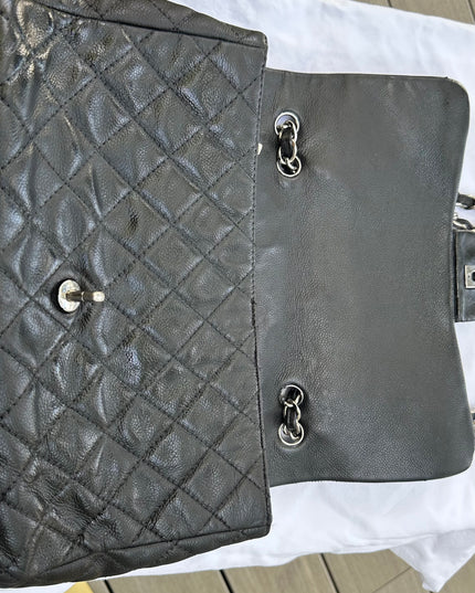 Sold! Chanel black caviar flap bag