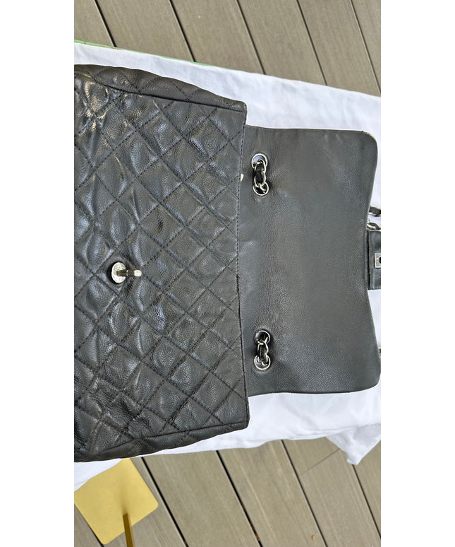 Sold! Chanel black caviar flap bag