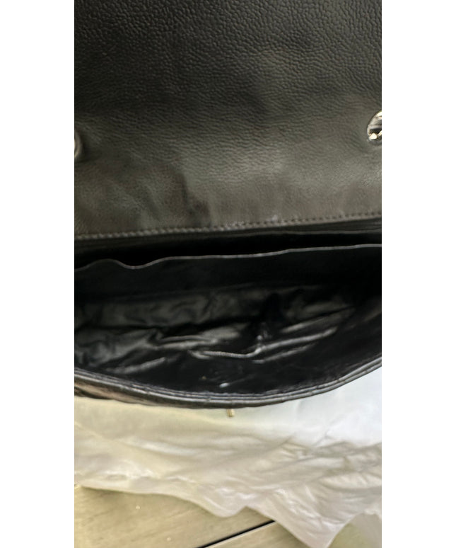 Sold! Chanel black caviar flap bag