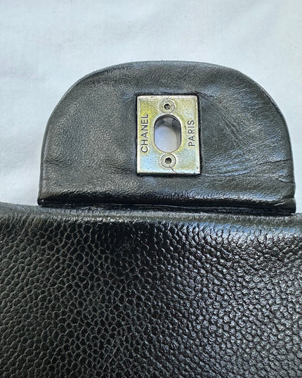 Sold! Chanel black caviar flap bag