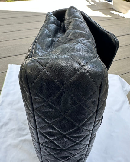 Sold! Chanel black caviar flap bag