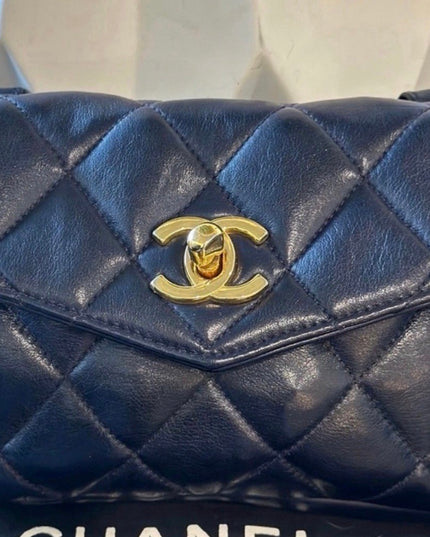 Chanel black quilted belt turn lock bag with crossbody strap