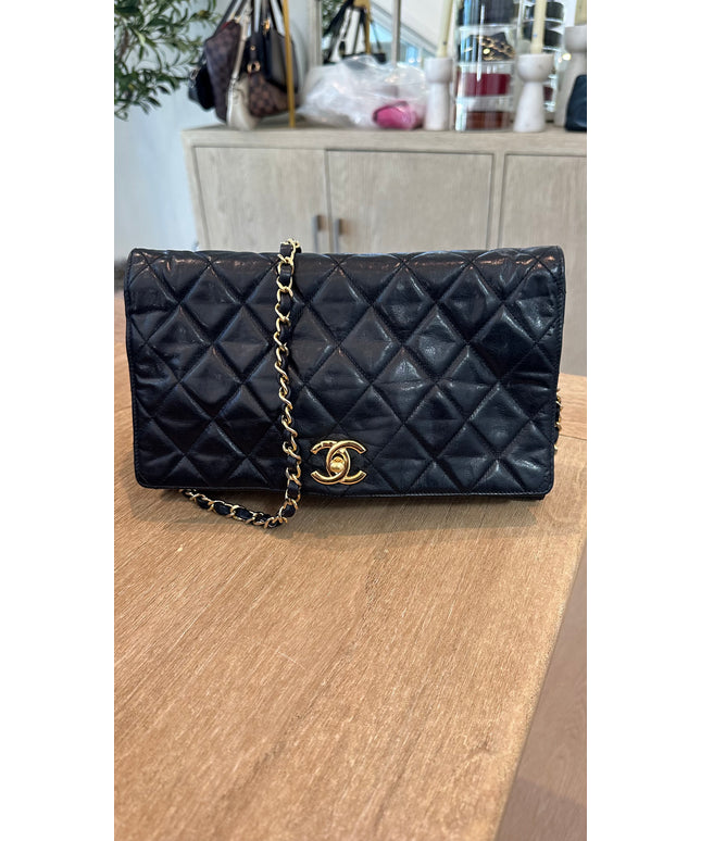 Sold!! Chanel black quilted calfskin flap turnlock bag