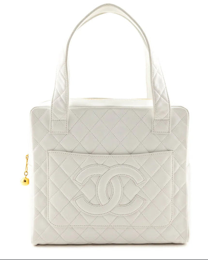 Authentic vintage Chanel white calfskin leather quilted handbag tassel Bag