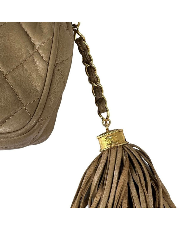 Sold!!  Chanel Beige quilted tassel camera crossbody bag