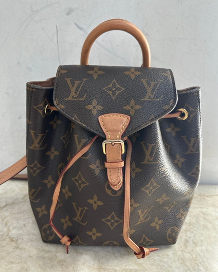 Sold!! authentic Louis Vuitton monogram montsouris BB backpack