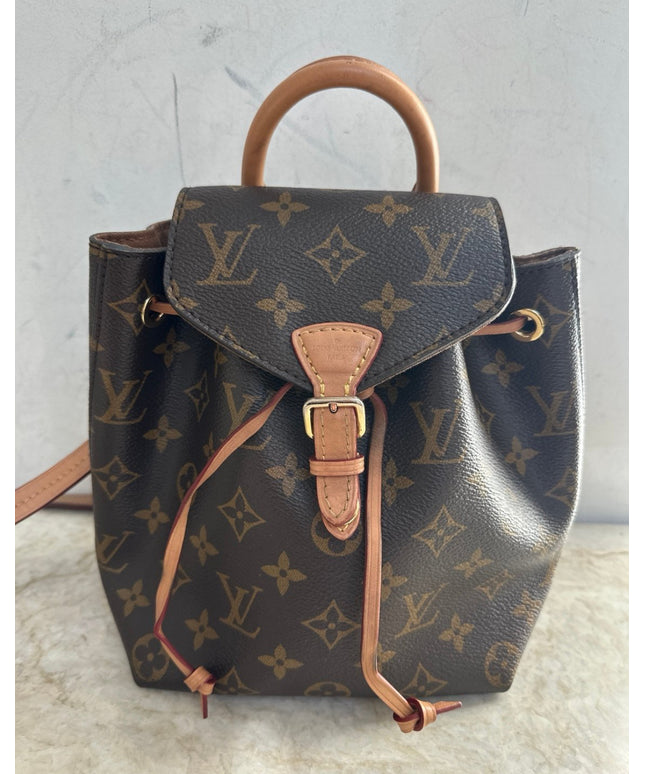 Sold!! authentic Louis Vuitton monogram montsouris BB backpack