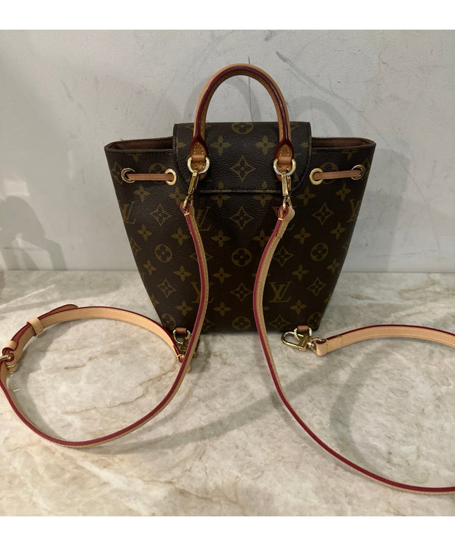 Sold!! authentic Louis Vuitton monogram montsouris BB backpack