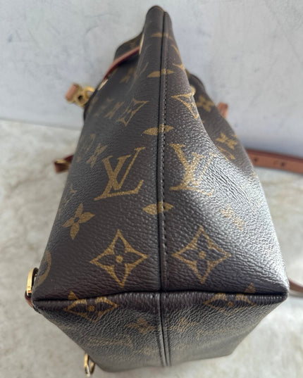 Sold!! authentic Louis Vuitton monogram montsouris BB backpack