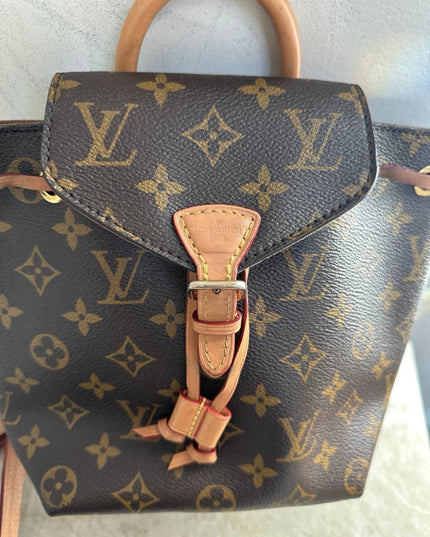 Sold!! authentic Louis Vuitton monogram montsouris BB backpack