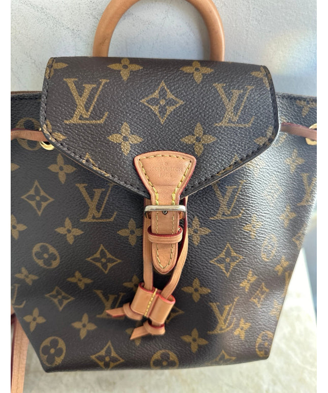 Sold!! authentic Louis Vuitton monogram montsouris BB backpack