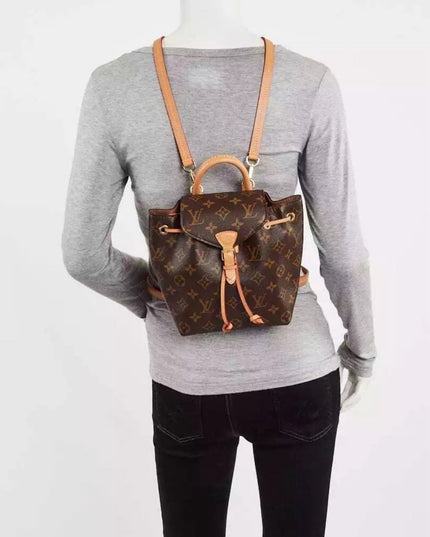 Sold!! authentic Louis Vuitton monogram montsouris BB backpack