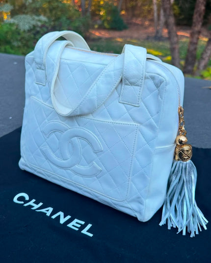 Authentic vintage Chanel white calfskin leather quilted handbag tassel Bag